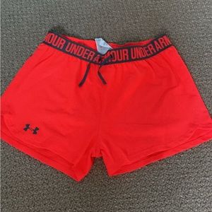 Under armour neon orange workout shorts.